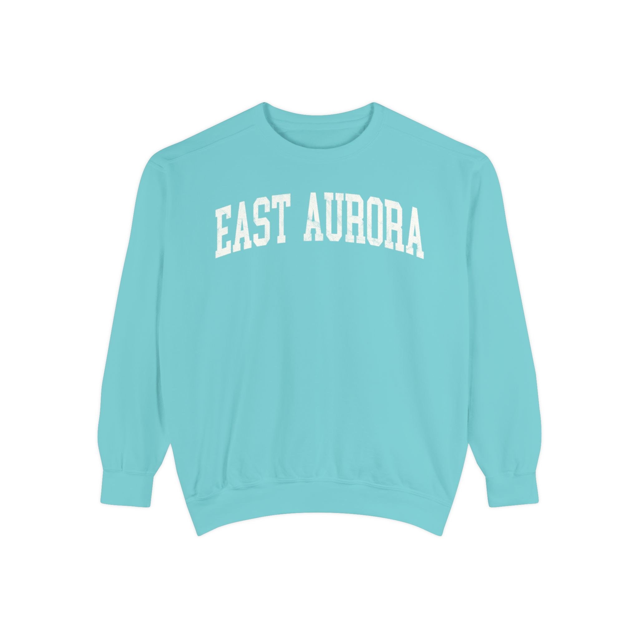 East Aurora Garment-Dyed Crewneck in Light Ice, front — EAST AURORA lettering