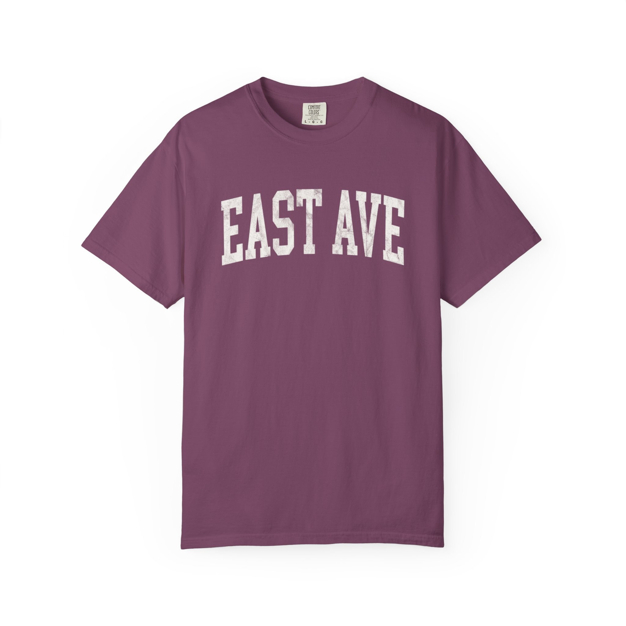East Ave Garment-Dyed Tee in Açai Berry, front — EAST AVE lettering