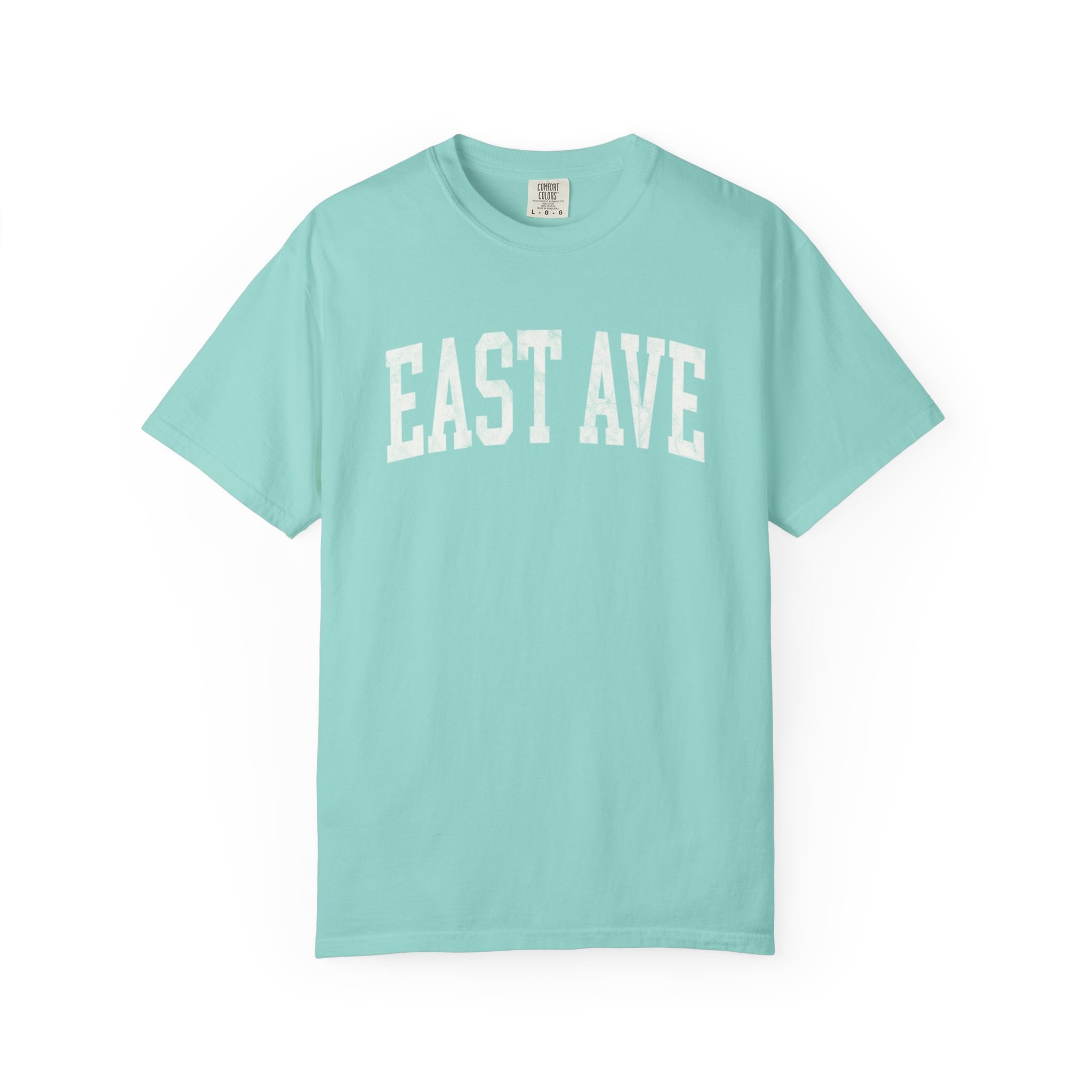 East Ave Garment-Dyed Tee in Light Ice, front — EAST AVE lettering