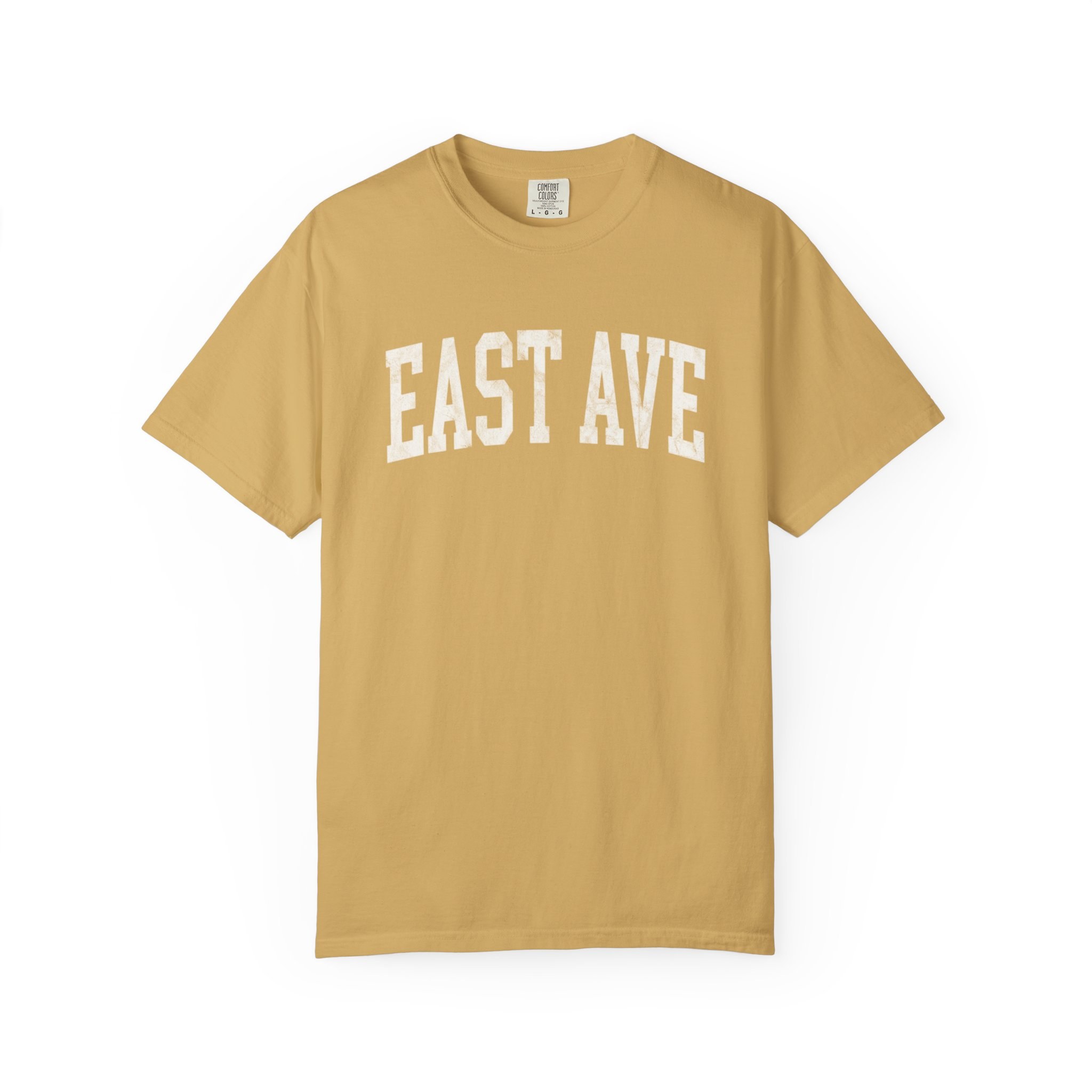 East Ave Garment-Dyed Tee in Pasta Wheat, front — EAST AVE lettering