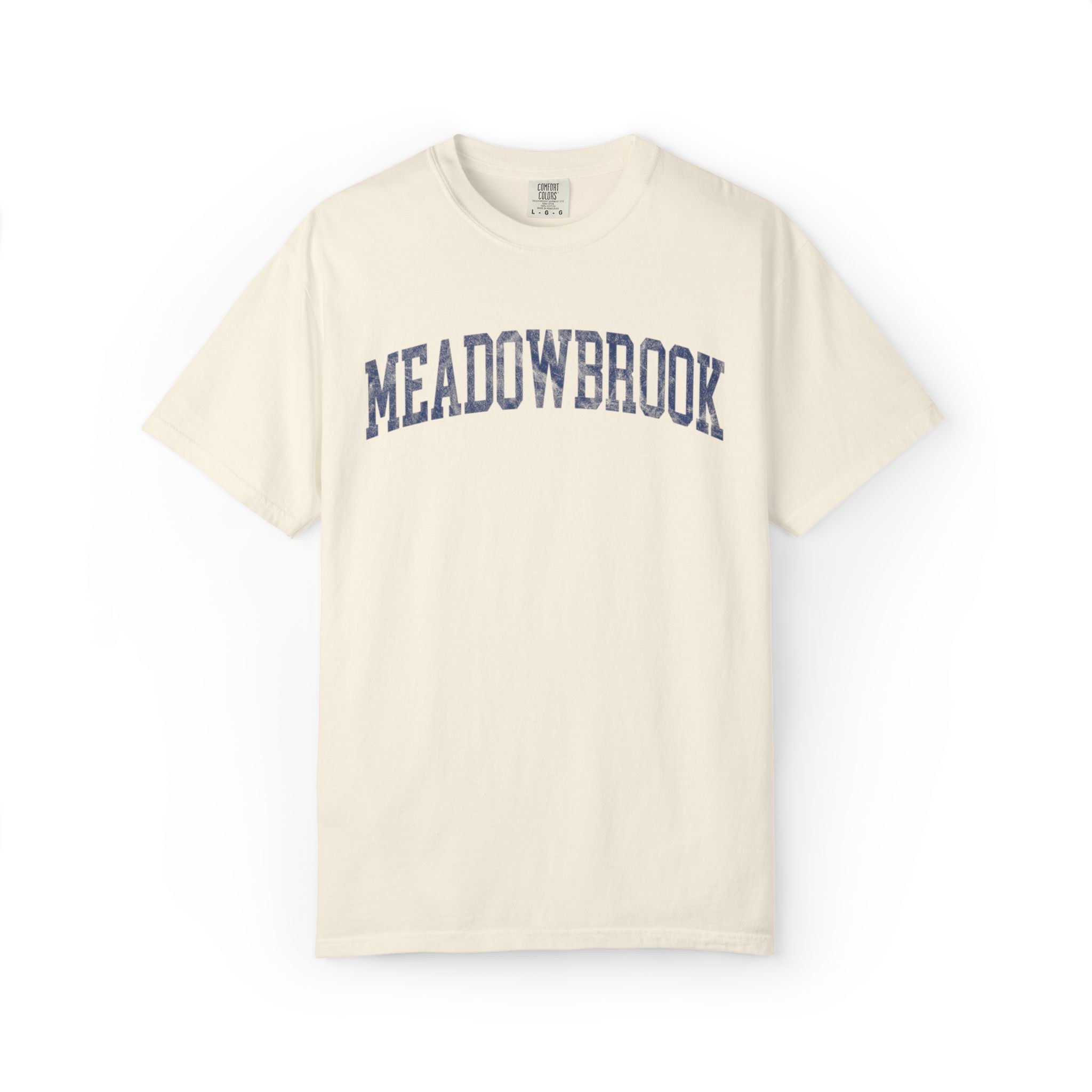 Meadowbrook Garment-Dyed Tee in Crème Fraîche, front — MEADOWBROOK lettering