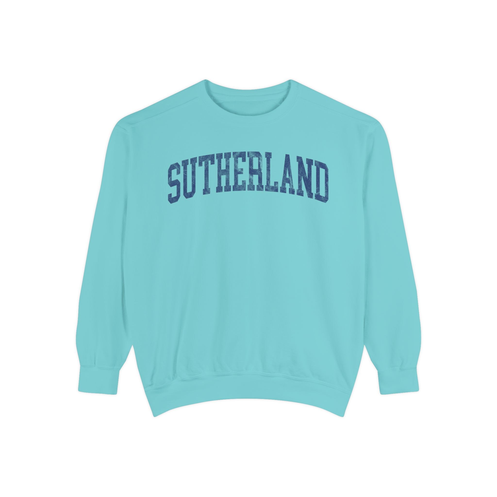 Sutherland Garment-Dyed Crewneck in Light Ice, front — SUTHERLAND lettering