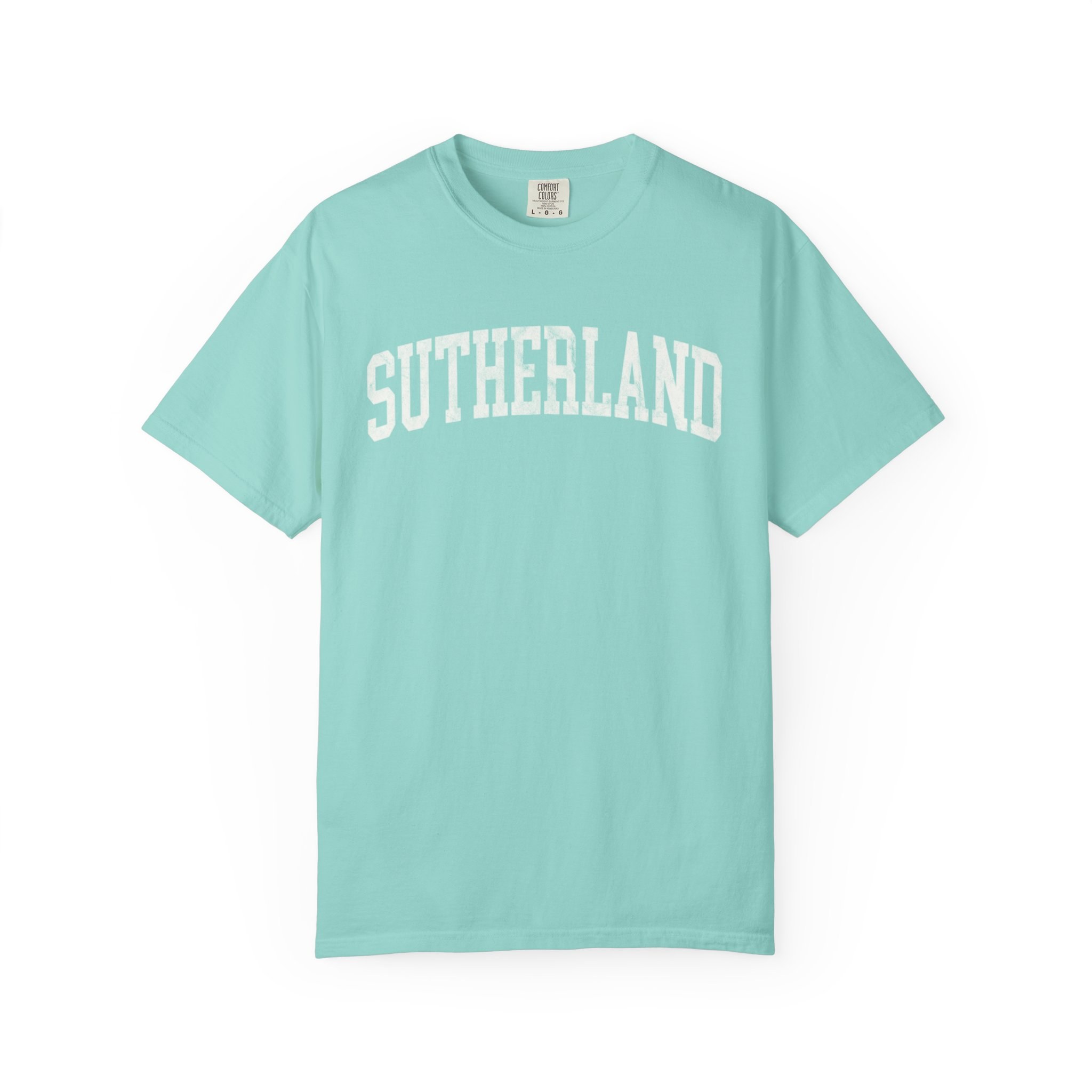 Sutherland Garment-Dyed Tee in Light Ice, front — SUTHERLAND lettering