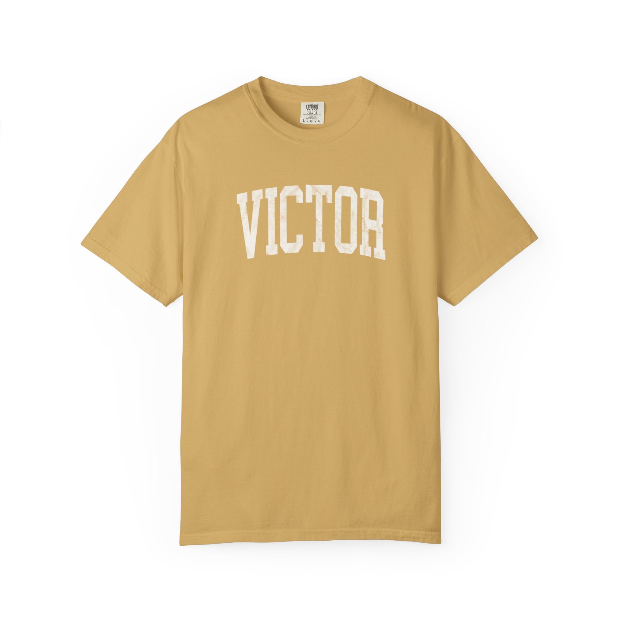 Victor Garment-Dyed Tee in Pasta Wheat, front — VICTOR lettering